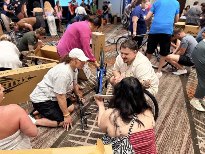 AAA employees assemble 102 bikes for Maui foster youth